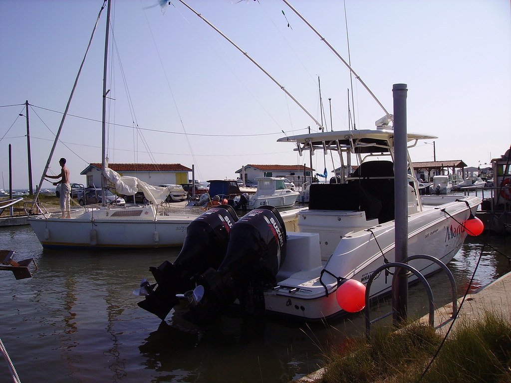 Fishing boat with twin 300 hp Suzuki outboard motor